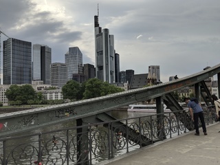 View of a city skyline from a bridge.